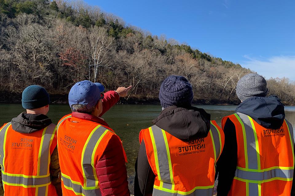 Dr. Ronaldo Luna with students on a site visit near a Missouri bridge